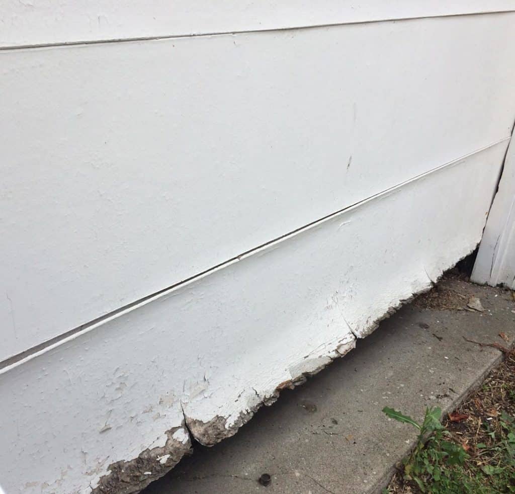 Garage door wood panel replacement